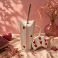 handmade pink striped ceramic sipper mug with red hearts and moon lid