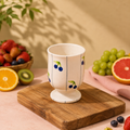 Hand-painted blueberry mug pedestal cup with blue berries and stripes