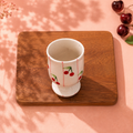 Hand-painted cherry mug pedestal cup with red cherries and pink stripes